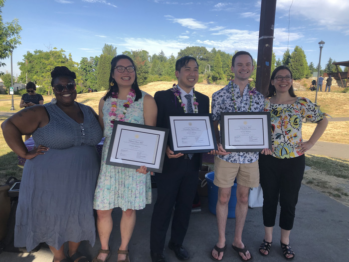 Group shot of graduating geriatric medicine fellows at gas works park