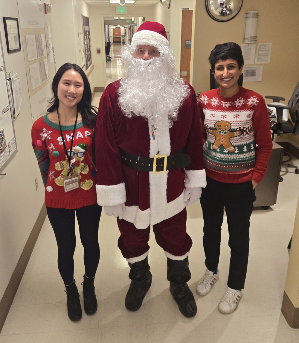 Santa and some ugly christmas sweaters